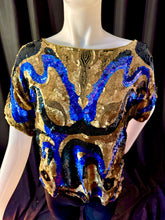 Load image into Gallery viewer, Front View on Mannequin:  Oleg Cassini vintage top. 100% black silk shell with hand sewn sequins, black rayon lining. Hand wash only.
