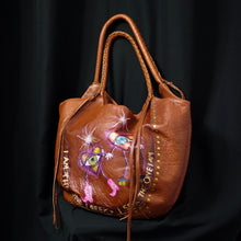 Load image into Gallery viewer, &quot;The Seeker&quot; Large Boho Leather Bag with tassels, antique brass, 3/4 view.
