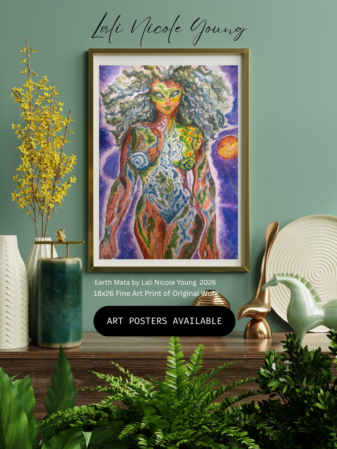 A framed art print featuring a colorful, stylized female figure with voluminous hair and earthy tones, displayed on a shelf in a styled room with plants, vases, and decorative objects. Text on the image reads 'Lali Nicole Young' and 'Earth Mata by Lali Nicole Young 2026 18x26 Fine Art Art Print of Original Works.