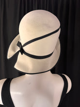 Load image into Gallery viewer, Back view: Mr John Jr mid century vintage black and white cloche hat from 1960s. Clean, minimalistic design and flawless 
