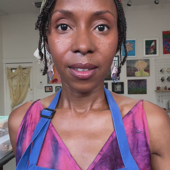 A video clip of Lali Nicole Young showing "Abstract" original painting in a gold vintage frame. She is speaking from her studio space at Temple Arts Collective.