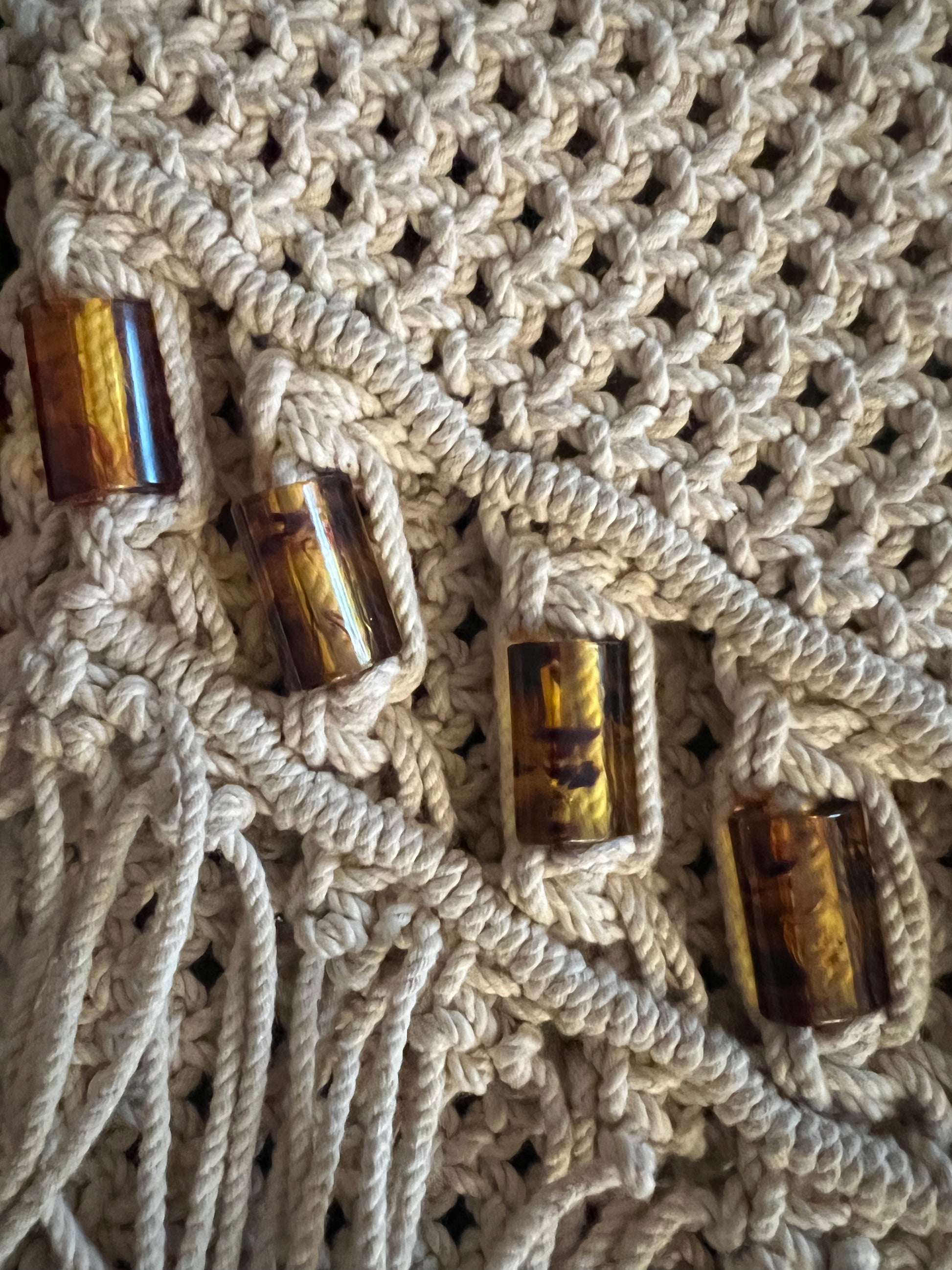 Amber Bead close up. 1970s handmade macrame shoulder bag with Amber beads.